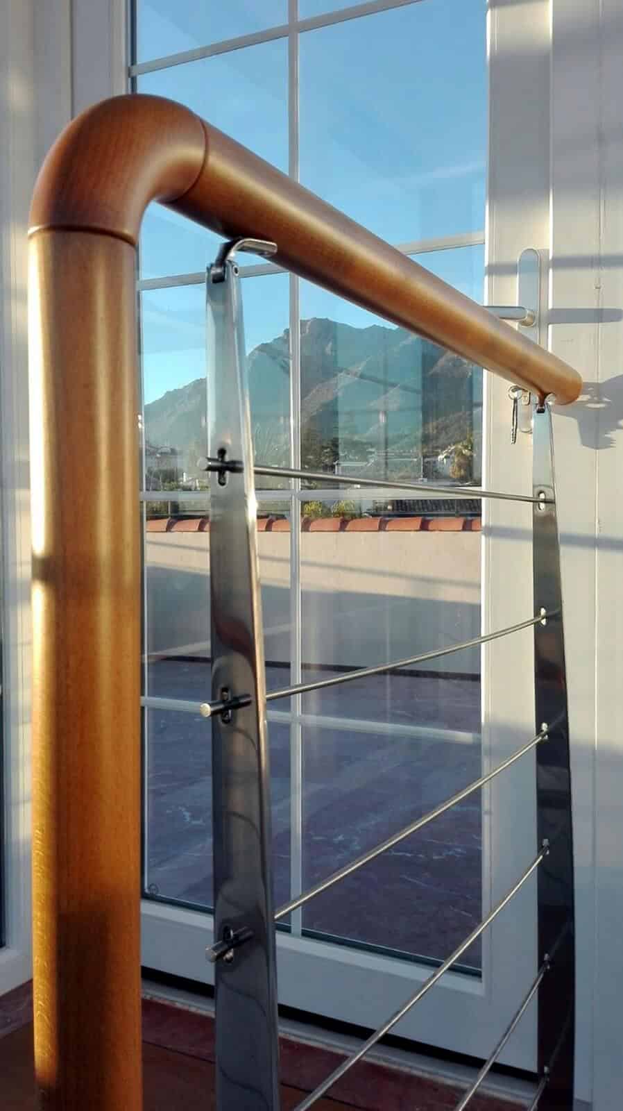 Baranda acero inox de escalera de caracol de Enesca