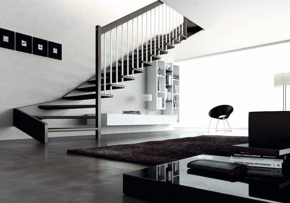 Escalera de tramos modelo Livia con peldanos de madera y barandilla modelo R32 de Enesca